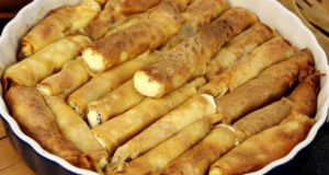 Запеченные блины творогом и изюмом