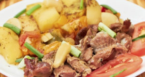 Куриные желудочки с овощами в духовке